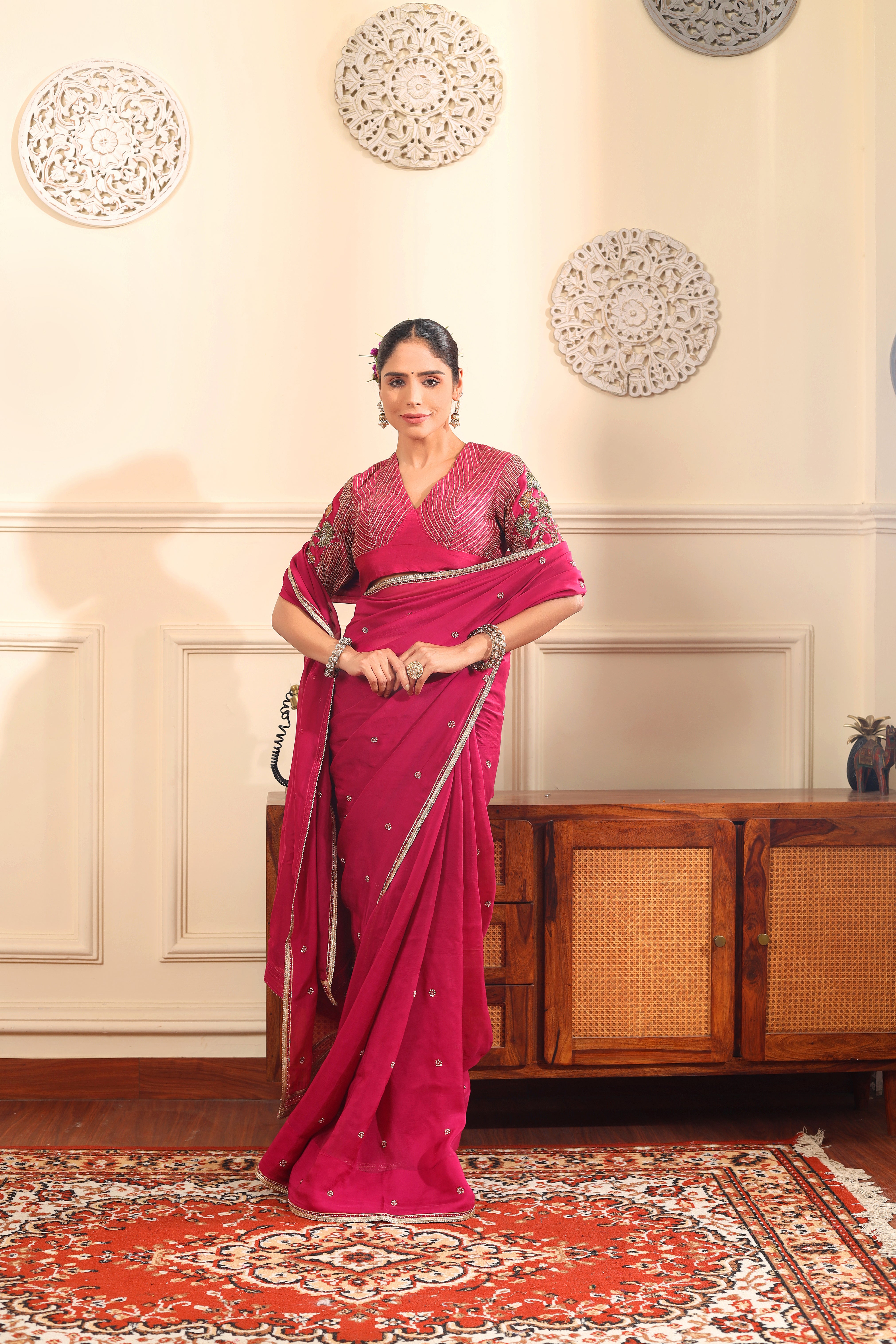 HOOR - Rani pink organza saree with heavy embroidered blouse.