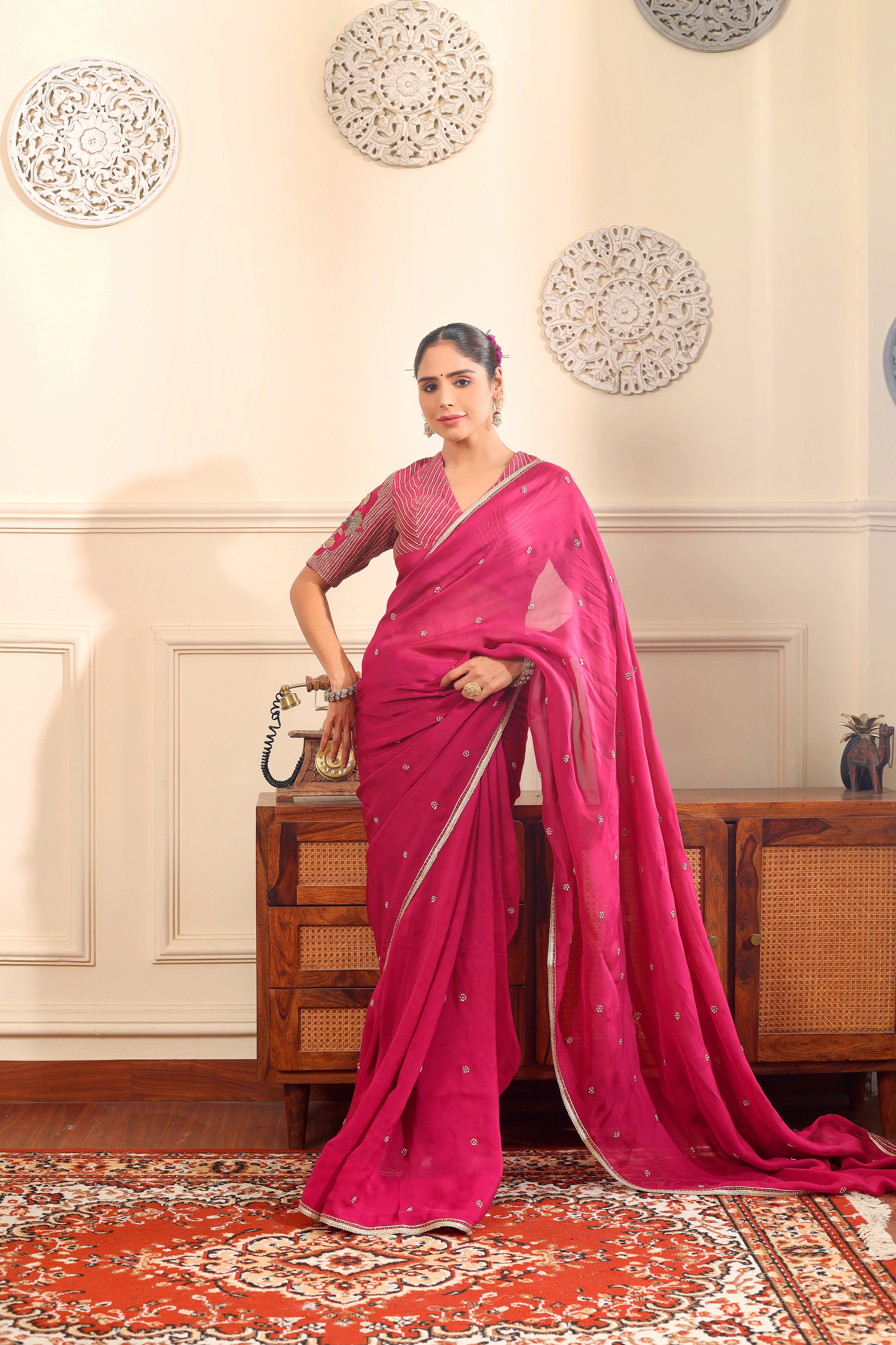 HOOR - Rani pink organza saree with heavy embroidered blouse.