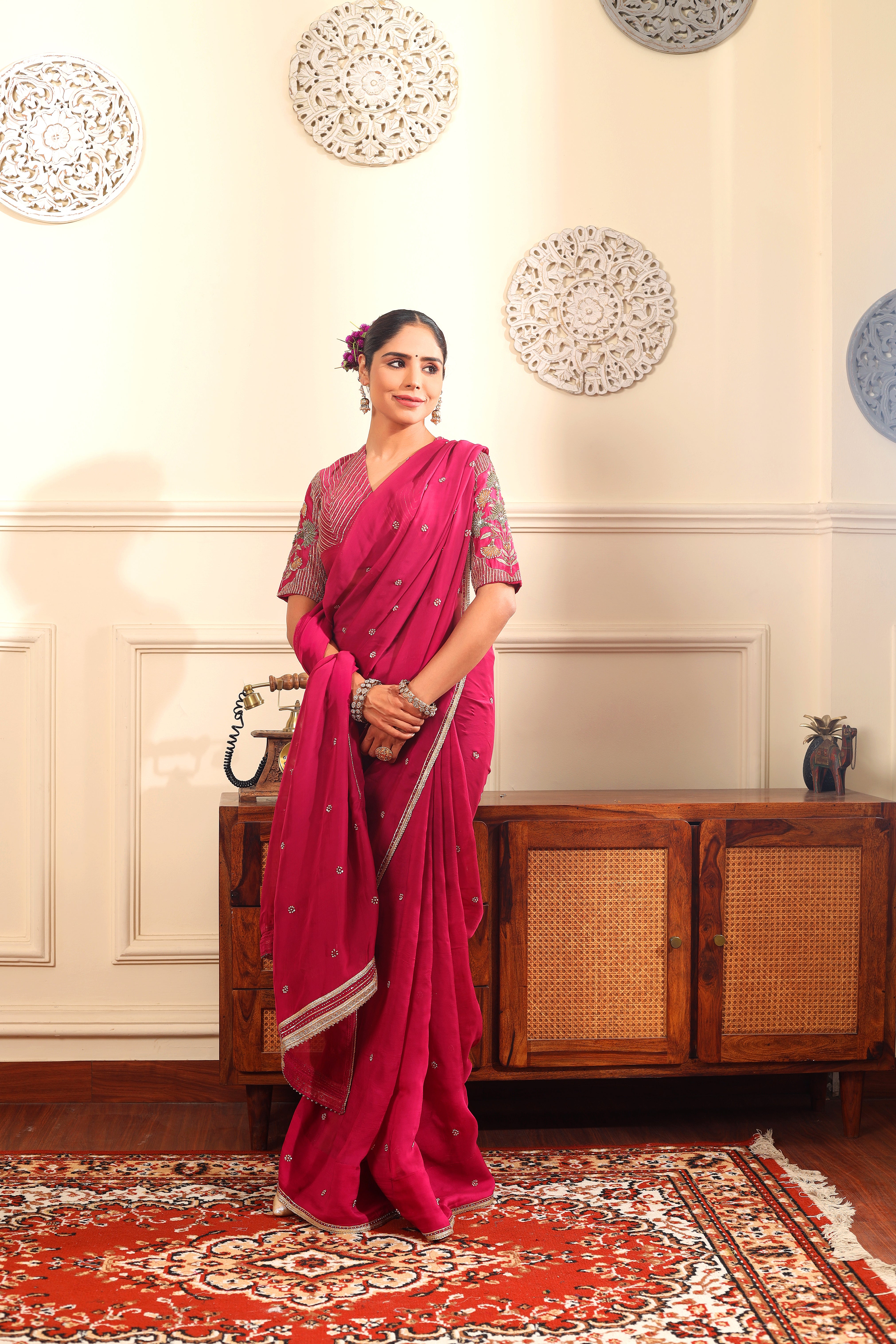 HOOR - Rani pink organza saree with heavy embroidered blouse.