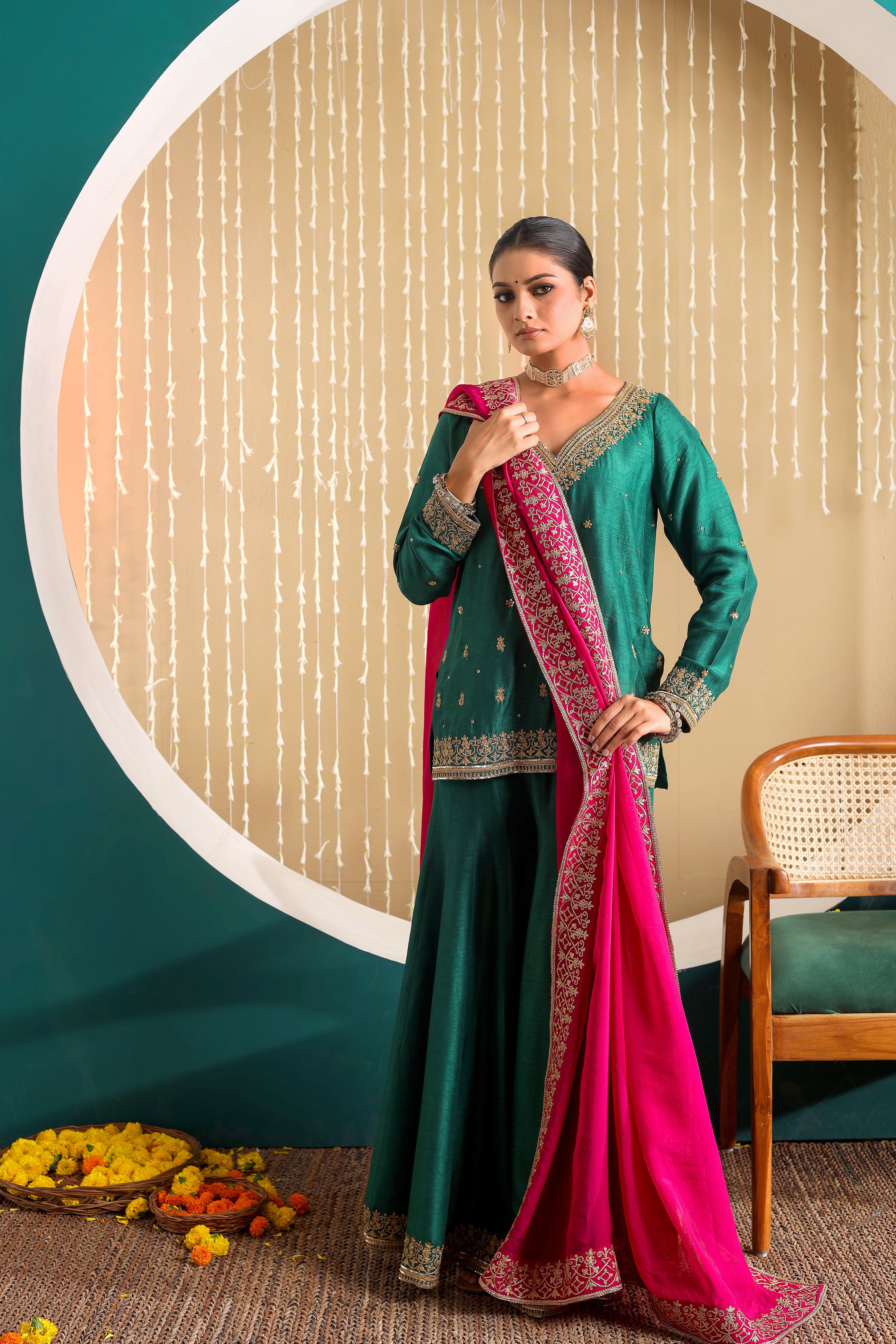 GULBANO - Green row silk pure hand embroidered sharara set with pink organza dupatta.