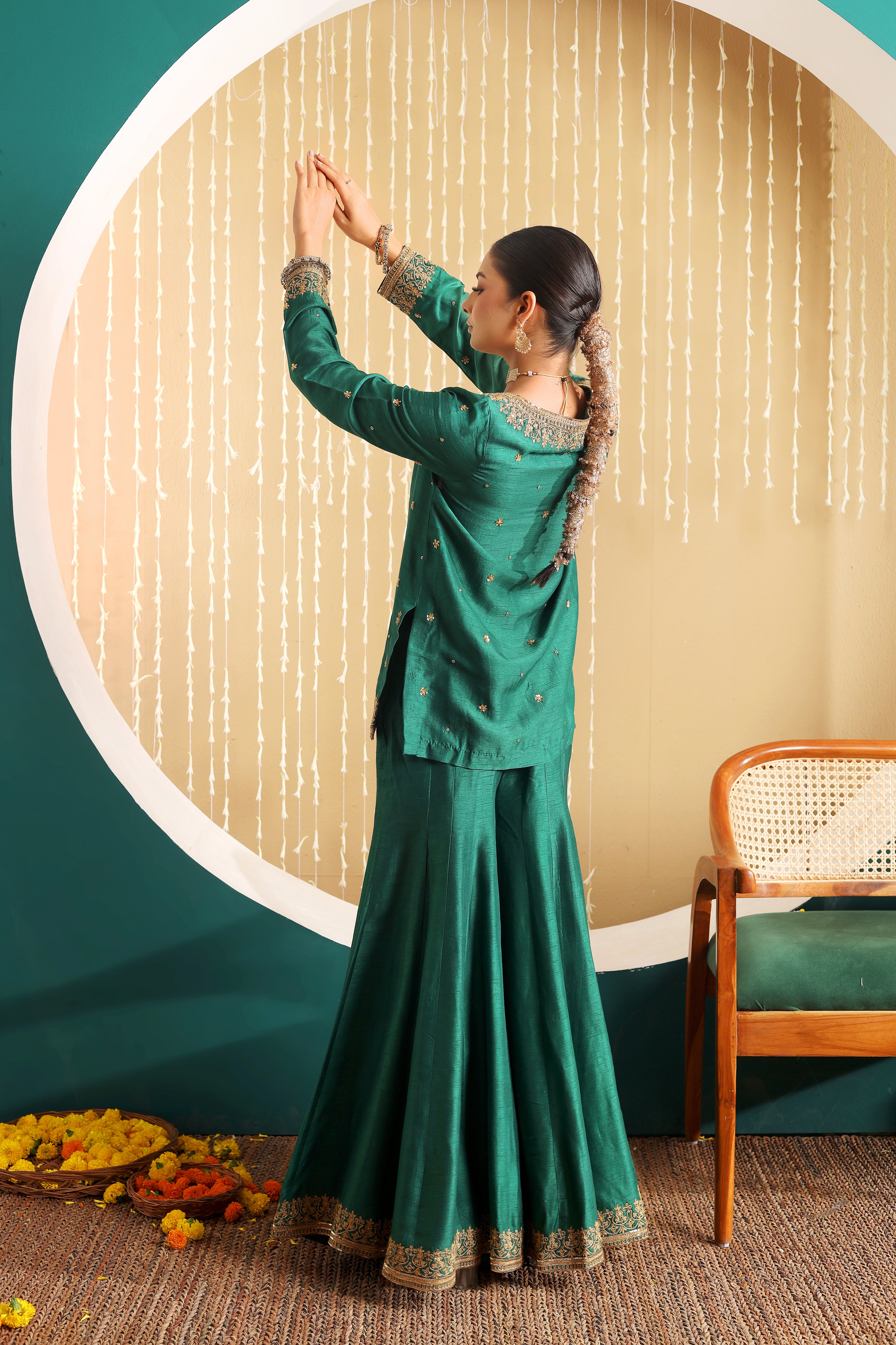 GULBANO - Green row silk pure hand embroidered sharara set with pink organza dupatta.